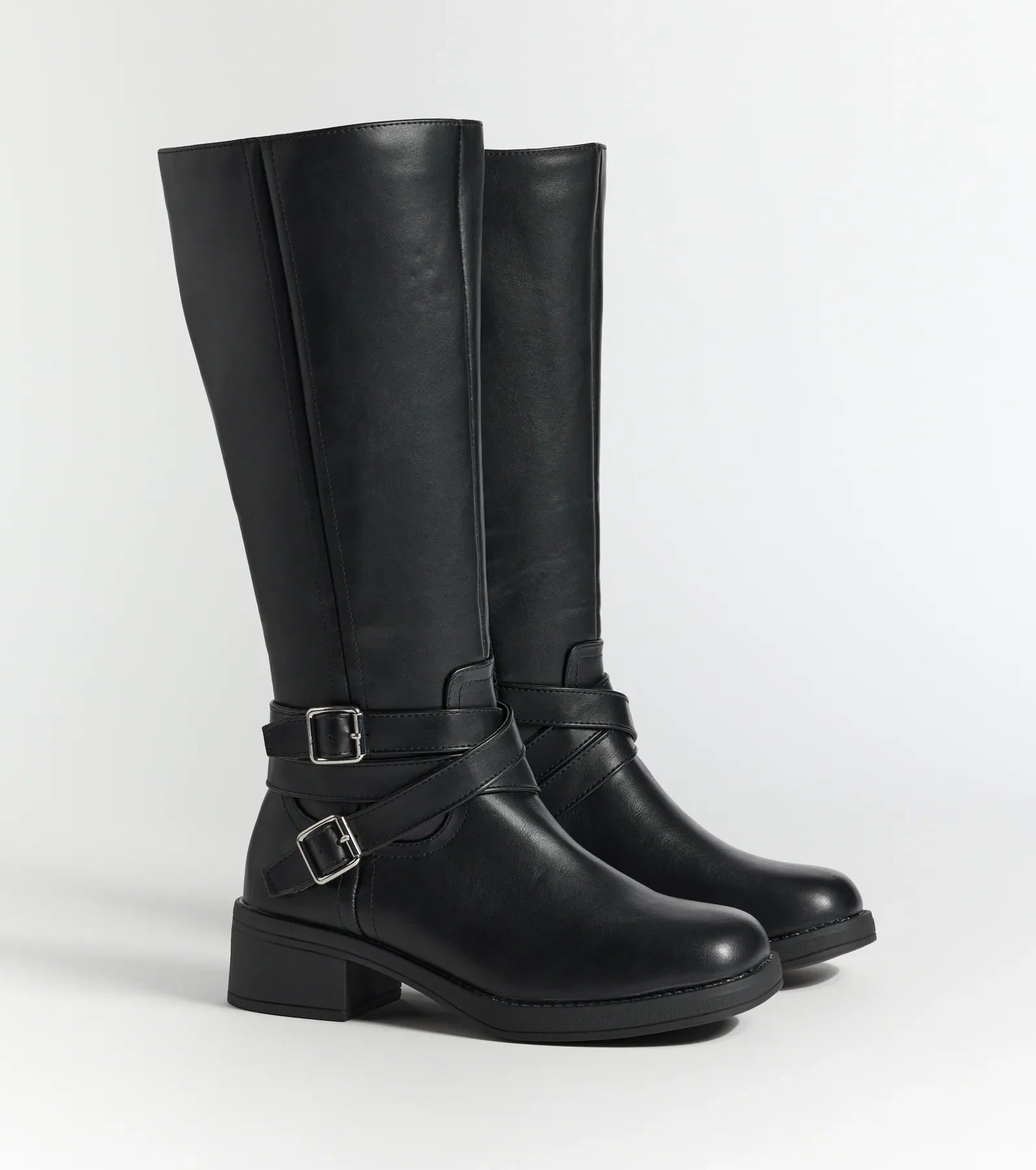 Effortlessly Edgy Under-The-Knee Boots